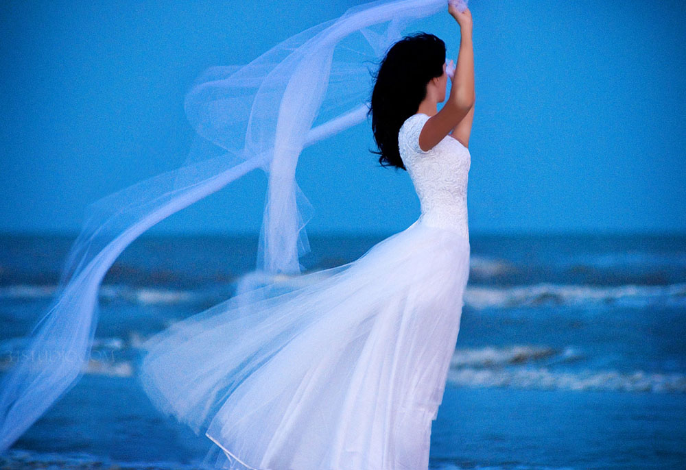 galveston blue sky bride flying veil bridal portrait
