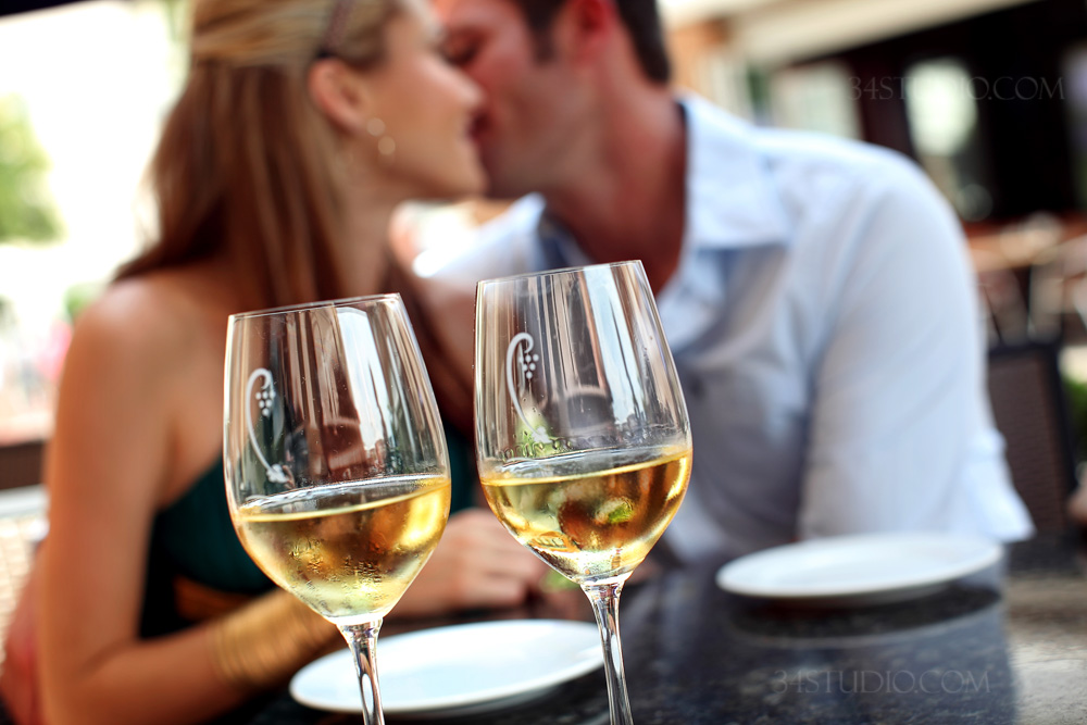 couple drinking wine in west village dallas